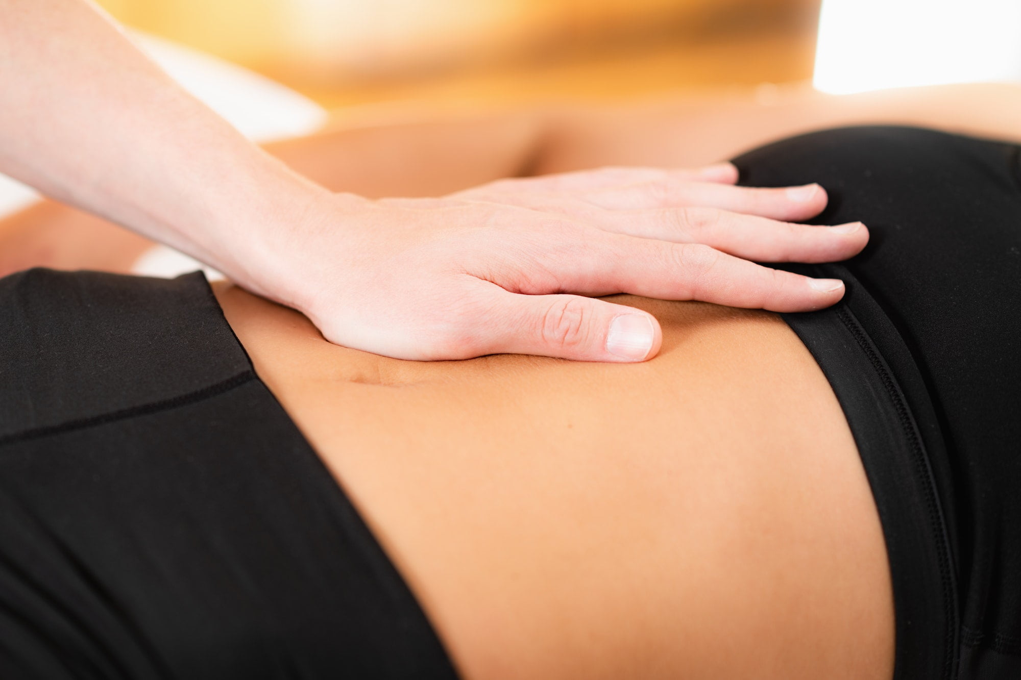 Chiropractor Working with Female Athlete