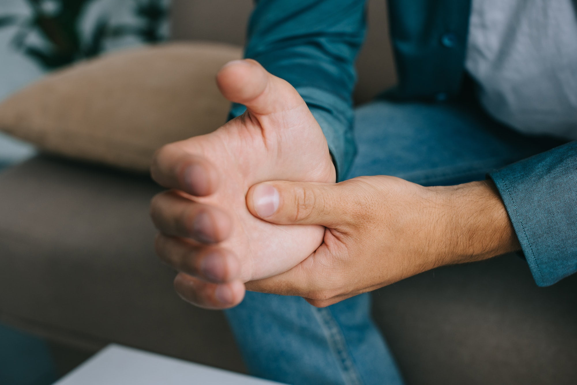 close-up partial view of man having wrist pain